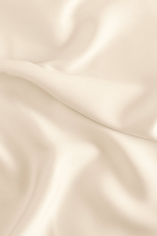 Close-up of Caro Home viscose from bamboo sheet fabric texture in hemp color