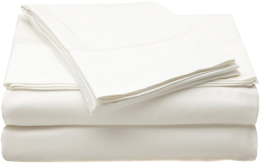 Caro Home bamboo sheet set folded in ivory, showing flat sheet and pillowcase detail